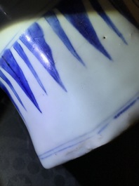 A Chinese blue and white covered vase with birds among flowers, Transitional period