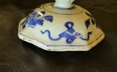 A Chinese blue and white covered vase with birds among flowers, Transitional period