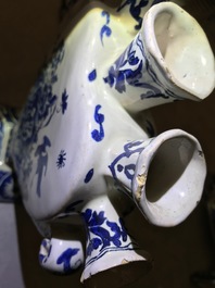 A pair of Dutch Delft blue and white heart-shaped tulip vases, 19th C.