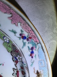 A Chinese famille rose basin and a pair of plates with 'antiquities' design, Qianlong