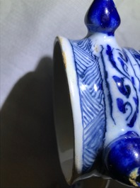 A large Dutch Delft blue and white ring-form puzzle jug, 1st quarter 18th C.