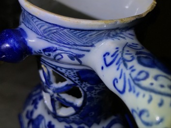 A large Dutch Delft blue and white ring-form puzzle jug, 1st quarter 18th C.