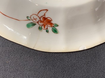 A pair of lobed Chinese famille verte cups and saucers, Kangxi