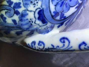 A large Dutch Delft blue and white ring-form puzzle jug, 1st quarter 18th C.