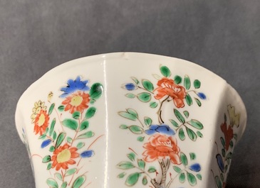 A pair of lobed Chinese famille verte cups and saucers, Kangxi