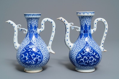 A pair of Chinese blue and white Islamic market jugs, Kangxi