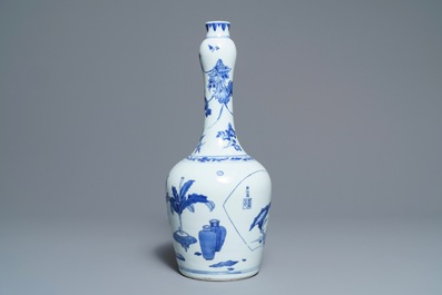 A Chinese blue and white bottle vase with inscription, Transitional period