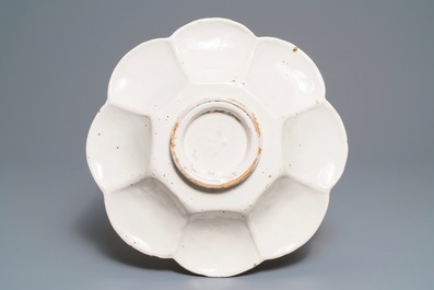 A large white Dutch Delft gadrooned dish, 17th C.