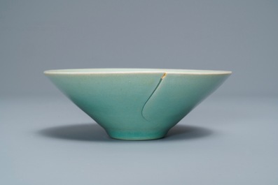 A Korean conical celadon bowl with underglaze floral design, Goryeo or later
