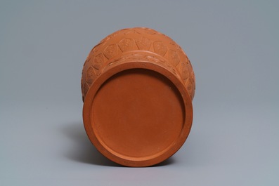 A Chinese Yixing stoneware baluster vase with applied design, Kangxi