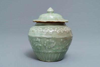 A small Chinese Longquan celadon vase and cover with underglaze design, Ming