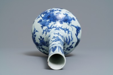 A Chinese blue and white bottle vase with birds in a landscape, Wanli