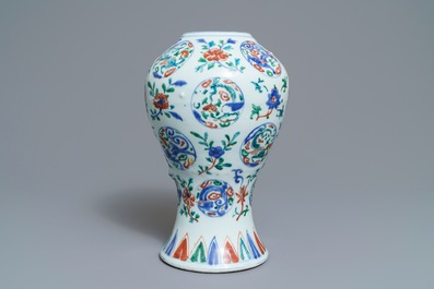 A Chinese wucai vase with dragon medallions and floral sprigs, Jiajing