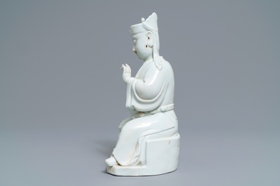 A Chinese blanc de Chine figure of Guandi, 18/19th C.