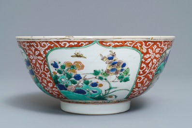A Chinese famille verte plaque with playing boys and a landscape bowl, Kangxi