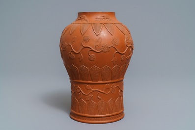 A Chinese Yixing stoneware baluster vase with applied design, Kangxi