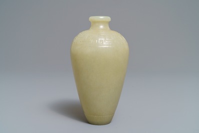 Een Chinese celadon jade meiping vaas met reli&euml;fdecor, 19/20e eeuw