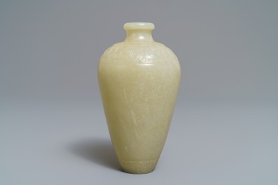 Een Chinese celadon jade meiping vaas met reli&euml;fdecor, 19/20e eeuw