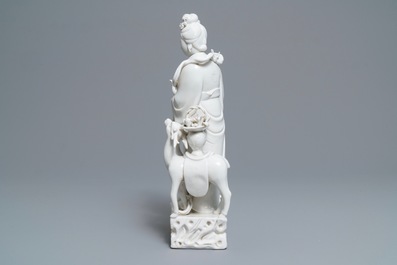 A Chinese Dehua blanc de Chine group of Magu with a deer, seal mark on the back, 18/19th C.