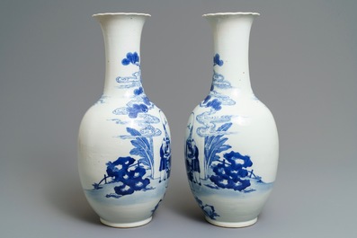 A pair of Chinese blue and white bottle vases, Kangxi mark, 19th C.