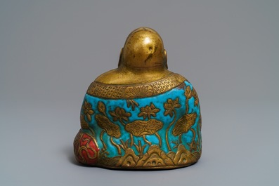 A Chinese champlev&eacute; enamelled copper figure of Buddha, Qianlong