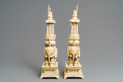 A pair of large inlaid Chinese ivory groups of Buddha and Guanyin on an elephant, ca. 1900