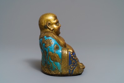 A Chinese champlev&eacute; enamelled copper figure of Buddha, Qianlong