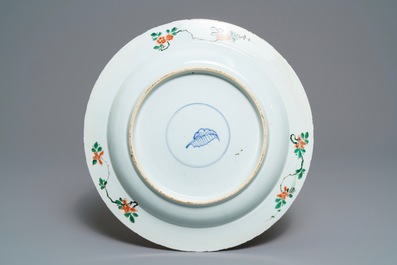 A fine Chinese famille verte dish with ladies in a garden, Kangxi