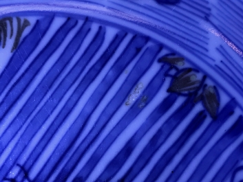 A rare Chinese blue and underglaze red bowl with carps and marine animals, Xuande mark, Kangxi