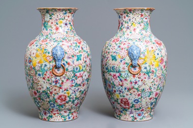 A pair of Chinese famille rose 'millefleurs' vases, Qianlong mark, Republic, 20th C.