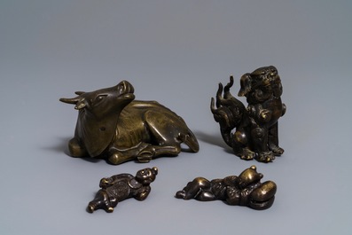 Four Chinese bronze scroll weights, 18/19th C.