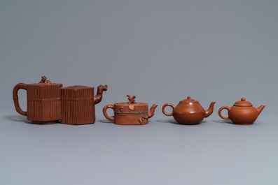 Four Chinese Yixing stoneware teapots and covers, 19/20th C.