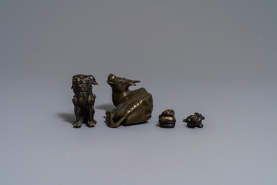 Four Chinese bronze scroll weights, 18/19th C.