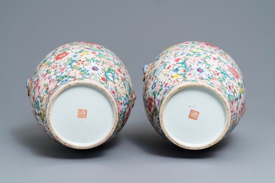 A pair of Chinese famille rose 'millefleurs' vases, Qianlong mark, Republic, 20th C.