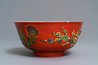 A Chinese coral-red relief-decorated bowl, 19th C.