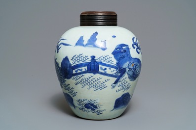 Un pot en porcelaine de Chine bleu et blanc &agrave; d&eacute;cor d'un kylin, &eacute;poque Transition