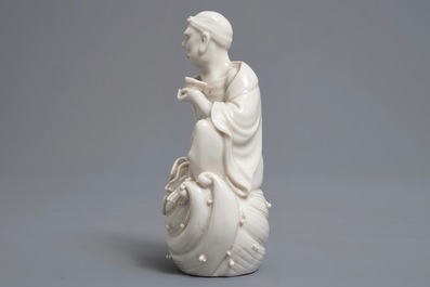 Two Chinese Dehua blanc de Chine models of a Luohan and Guanyin with servant, 19th C.