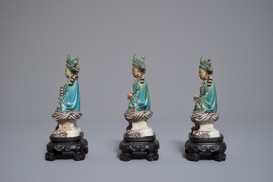 Three Chinese enamel on biscuit figures of Buddha, 19/20th C.