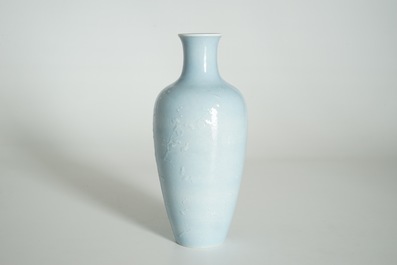 A Chinese monochrome lavender-blue vase with underglaze design, Yongzheng mark, 19th C.