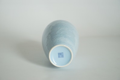 A Chinese monochrome lavender-blue vase with underglaze design, Yongzheng mark, 19th C.