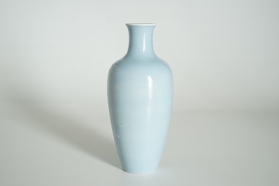 A Chinese monochrome lavender-blue vase with underglaze design, Yongzheng mark, 19th C.