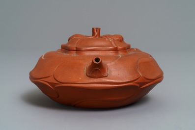 A Chinese Yixing stoneware flower-shaped teapot, Kangxi