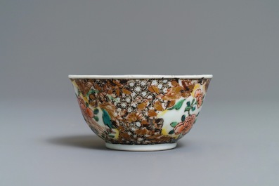 A Chinese famille rose 'pheasant' cup and saucer, Yongzheng