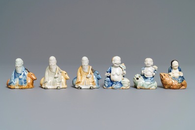 Six Chinese blue, white and celadon biscuit figures, Qianlong