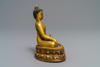 A gilt bronze figure of Buddha Vajrasana, Tibet, 15/16th C.