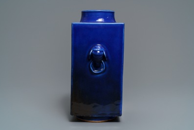 A Chinese calligraphy plaque dated 1947 and a monochrome blue cong vase, 19th C.