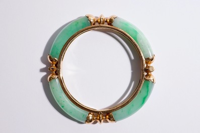 A set of Chinese jade and 18-carat gold jewelry: a bracelet, a ring and four pendants, 20th C.