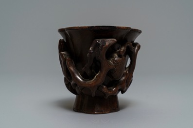 A Chinese carved bamboo libation cup with floral design, 18/19th C.