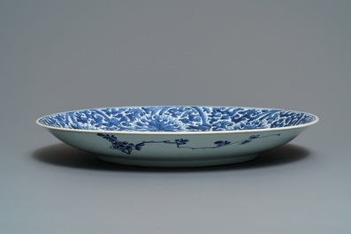 A large Chinese blue and white lotus scroll dish, Kangxi