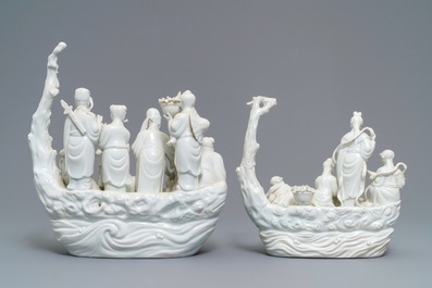 Two Chinese Dehua blanc de Chine groups with immortals on log boats, 19th C.